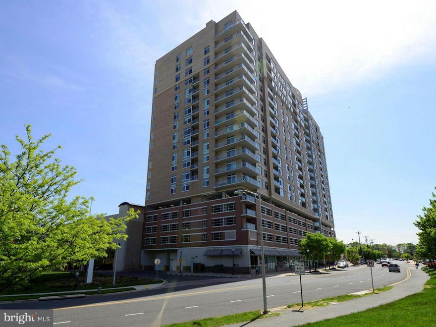 Luxurious Condo w/ Amazing Features.Gourmet Kit w/ Granite Counters, Italian Cabinetry & SS Appls. Pristine HWD Floors. Access to Balcony w/ Stunning Views. Lrg Master w/ Floor to Ceiling Windows. Spa Like Bath, W/D in Unit.Reserved Parking in Garage. GREAT Building Amenities, Pet Friendly! Rooftop Pool & Deck. Close to I-270, 355, Metro Accessible. Enjoy Pike & Rose and Rockville Town Center!