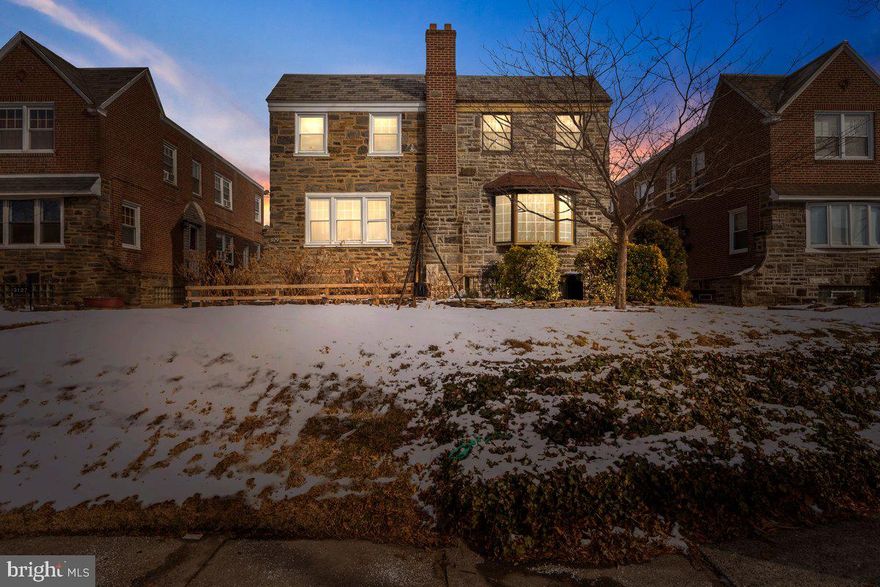 Welcome home to this meticulously maintained 3 bedroom, 1.5 bath, stone front twin that's situated on a quiet street in the heart of the highly desirable Sandyford Park section of N.E. Phila.  Approaching you will immediately notice the pride of ownership at it's finest for over 43 years by the charming curb appeal that displays tasteful landscaping, all stone front exterior, private front patio, custom brick steps, and a oversized front bay window that allows an array of natural light t/o. Enter and  you'll instantly fall in love with the gorgeous parquet hardwood flooring with bordering inlays. The bright and spacious living room which is highlighted by an oversized front bay window also showcases custom built shelving and mantle for the gas fireplace as well as lovely crown molding. The formal dining room is the perfect size for those large family gatherings and it includes a roomy coat closet, light fixture with ceiling medallion, crown & chair rail molding, and an additional side bay window . The eat-in kitchen features plenty of cabinetry, an abundance of granite counter top space, recessed lighting, built in appliances, ceiling fan light fixture, brick accent wall, and access to the large composite deck with retractable awning.  . The second floor boasts a large master bedroom with his & her closets, freshly painted, and a timeless white ceramic tile surround hallway bathroom with a soaking  tub and glass stall shower. The two additional bedrooms are both a generous size with ample closet space, ceiling fan light fixtures, and have been freshly painted. The oversized lower level is completely finished an is suited perfectly as a family room/playroom/possible 4th bedroom, that provides additional living space which features recessed lighting, durable laminate flooring, half bath, multiple storage closets, brick accent wall, a 8ft x 9ft bonus room to be utilized as you desire, separate laundry area with all the amenities, inside access to the half garage.  Some additional features include 5 wall mounted mini split systems with heat pump, in close proximity to all major highways, public transportation, excellent schools, food markets are walkable, and plenty of shopping. This home has been impeccably maintained from top to bottom and it clearly shows!!