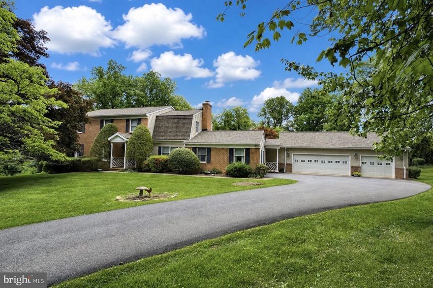 Welcome Home! Nestled on 2.20 picturesque acres, this beautiful home offers space, comfort, and versatility both inside and out. The main level is designed for everyday living and effortless entertaining, featuring a welcoming entertaining room off the side entrance, a spacious laundry room with folding table, full and half bathrooms, an elegant sitting room with a cozy fireplace, and a sun-filled sunroom with skylights overlooking the serene backyard. The spacious kitchen offers room for a large dining table and flows seamlessly into the formal dining room and expansive living room, Sunroom provides access to the rear deck for easy indoor-outdoor living and entertaining.

Upstairs, you’ll find 4 generously sized bedrooms, including a primary suite complete with an en-suite bathroom and walk-in closet. The finished walkout basement provides endless possibilities with multiple flex spaces ideal for a gym, home offices, recreation or entertaining areas, along with a cedar closet and an additional full bathroom.  3 Car Garage and Large Driveway provide lots of parking! A rare combination of privacy, functionality, and charm in a beautiful setting.