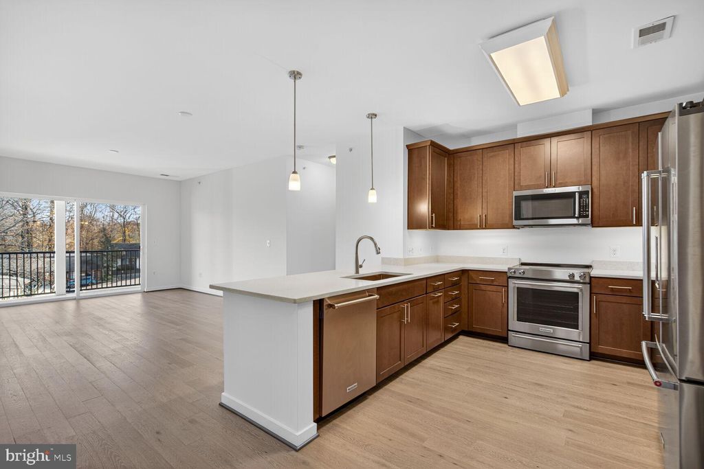 Photo of 9450 Silver King Court #401, FAIRFAX, VA 22031 (MLS # VAFC2007388)