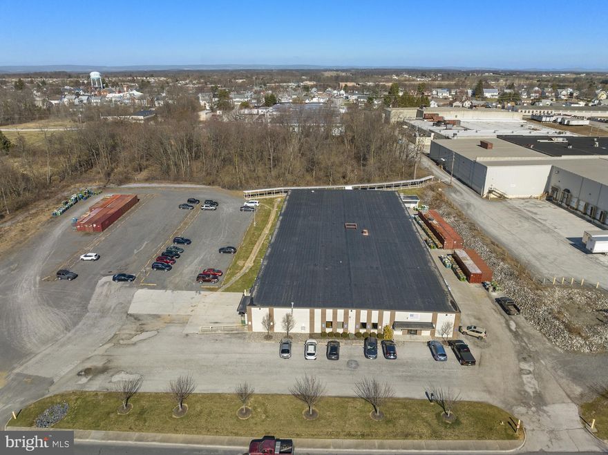 Industrial opportunity 30,000+ Sq. Ft. mfg/warehouse  facility fully sprinklered, 3 docks w/levelers. 1 drive in overhead door, separate office area, 277-480V 3 phase electric service, Central HVAC, ceiling clearance is 16  ft.  The fourth dock door is for trash receptecle.  There are two dock doors (1) 10x10 and other is 8x8.