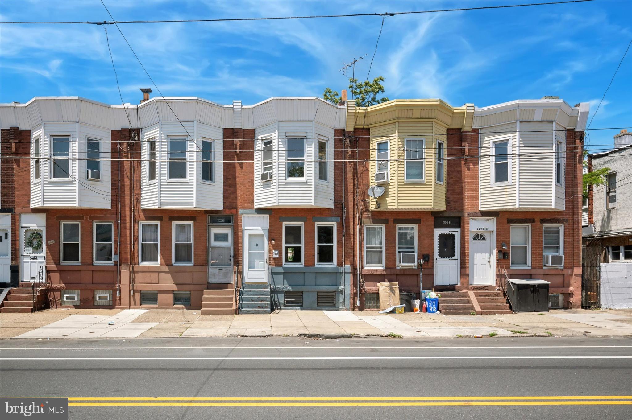 Welcome to 3096 Aramingo Avenue. This large and well maintained 3-bedroom, 1 bathroom home located in the heart of Port Richmond has a spacious living area that features original hardwood floors, ceiling fan, and unique built-in shelving that makes this home a rare find. The separate dining area is perfect for entertaining guests or family gatherings and is a nice size. The kitchen has plenty of counter and cabinet space for all of your cooking needs and also provides access to the large fenced in rear patio. Upstairs you'll find 3 nice sized bedrooms all with ceiling fans and ample closet space, and a shared hall bathroom. The basement can be used for extra storage space.