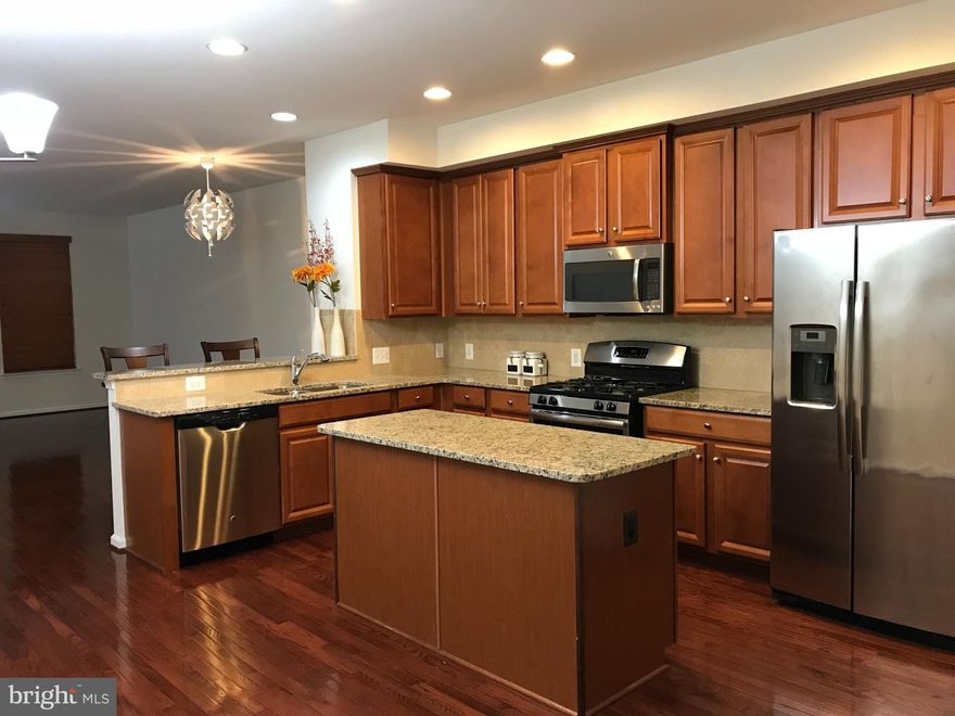 AMAZING RENTAL FIND!!! Beautiful 3 level townhome condo with 2 bedrooms, and a newly added  room in the basement that can be used for office/ den; and 2.5 bathrooms. Home boasts high ceilings, open floorplan. Rear entry large one car garage with fits a car and still has room for storage along with storage shelves that are installed in ceiling. Another vehicle can be parked in driveway, and plenty of open parking spots in front of the home. 
PROFESSIONALLY CLEANED, and MOVE IN READY!
Entry level has a room that can be used as an office, den, or bedroom, and half bathroom. Mid level boasts a large open dining room, living rom and kitchen that leads to deck. Modern townhome with many upgrades including high ceilings, hardwood floors throughout second level, granite countertops, upgraded cabinets, appliances, large sized washer and dryer. Great sized bathrooms with beautiful ceramic floors and countertop. A nice deck provides a beautiful relaxed view from the kitchen/family room level.
Community boasts a dog park, playgrounds, nature areas, ponds, tennis courts, clubhouses and more!