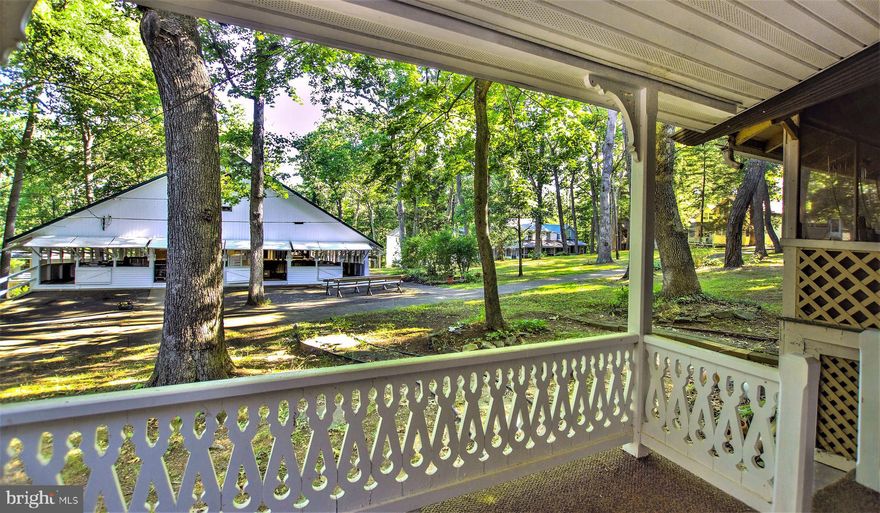 Fully furnished, move-in-ready cottage with Living room, Kitchen, 2-Bed, 1-Bath, and gingerbread porch in a 100-year-old grove of trees in the beautiful, quiet countryside of central Pennsylvania. Insulated exterior walls. 12-year-old roof. 15-year-old siding. Furnishings include window air-conditioner, propane fireplace, ceiling fans, appliances, and furniture (pictured). Reduce your $750 annual lease to $600 by supporting the cleanup days in mid-April and October. Warm social community. Approximately 50 cottages with 10-day program of meetings in mid-July, and five annual social events in mid-April, on Memorial Day, July 4th, Labor Day, and mid-October. The camp is a beautiful and serenely quiet setting superb for recreation, relaxation or tranquil solitude. When Association events are not in session, it is typical to find that you are the only one at the grove and you can enjoy the quiet serenity and peacefulness without interruption. For more than a century, generations of members and cottage owners have gone there for vacations, weekends or time away. Community facilities (pictured) include auditorium, dining hall, baseball field, walking running track, tennis/basketball court, shuffleboard pavilion, playground/exercise system & innumerable walking trails with abundant wildlife throughout the larger community and region. Two miles to the Susquehanna River for boating, fishing and swimming. Near Knoebel’s Amusement Park, pool & golf course, Gratz Farmer’s Market and Millersburg Ferry. 20 Minutes to Sunbury/Selinsgrove (shopping), 1 hr. to Harrisburg & Lebanon, 1.5 Hrs. from Lancaster, 3.5 Hrs. to NYC. INQUIRY PROCESS: TEXT OR CALL LISTING AGENT. Property not viable for flipping or rental investment of any type.