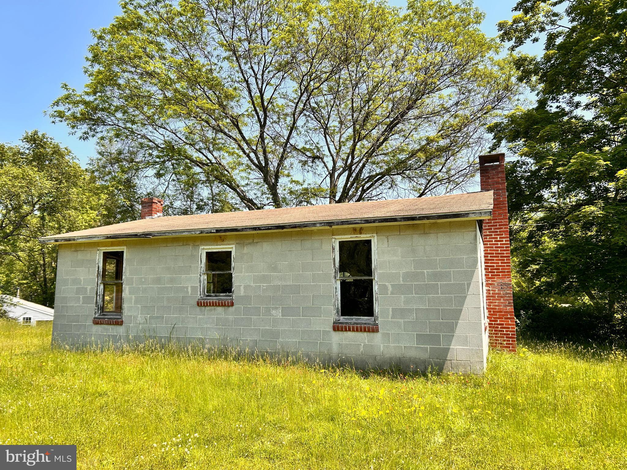 Blank slate on this camp property in Milroy. Almost 5 gorgeous acres located close to the Juniata River, state game lands and the Wilderness Lodge. Finish the inside and be ready for this hunting season in your new recreational property.