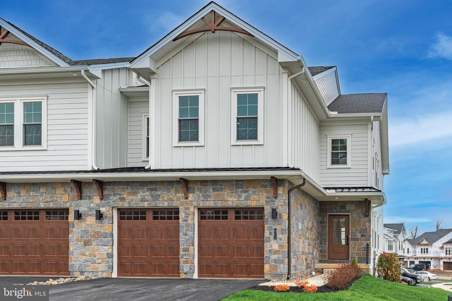 Model Home Now Available at Preserve at Maple Glen!
Step into elevated living with the Collins model home on Lot 6, a beautifully designed home filled with high-end upgrades and carefully curated finishes throughout.
From the moment you walk in, the attention to detail stands out— beautiful wide-plank flooring is a soft natural finish, custom trim work, and a bright, open layout that feels both inviting and refined. The great room makes a statement with its coffered ceiling, decorative beam detail, and gas fireplace all complemented by elegant wall paneling that adds warmth and character.
The kitchen is designed to impress, featuring custom two-tone cabinetry, a large center island, quartz countertops, designer backsplash, and a suite of high-end appliances with sleek finishes. A built-in bar area with wine refrigerator and appliance garage creates the perfect setup for entertaining and comfortable everyday living.   
Upstairs, the owner’s suite offers a true retreat with crown molding, custom closets, and a spa-like bath complete with a free standing soaking tub,   frameless glass shower with bench seat, and designer fixtures. Additional bedrooms,with walk in closets,  a beautifully finished hall bath, and convenient upper-level laundry complete the space.
Enjoy outdoor living on the expansive deck.
Set in a peaceful yet convenient location just minutes from shopping, dining, Route 309, and the PA Turnpike, this is a rare opportunity to own a fully upgraded model home without the wait.
