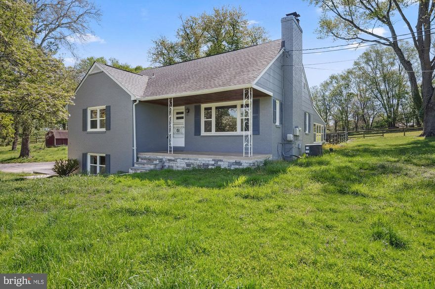 Over 5 open acres with a 2 stall barn, run in, detached garage, and freshly painted 4BR/2BA cape cod - what a perfect place to start your summer in desirable Woodstock! Ride the trails at Patapsco nearby if you keep your horses at home, or simply enjoy the seclusion and privacy in one of the best commuter locations in Maryland. Enjoy a large deck right off the sun room, expansive fenced in yard perfect for furry friends, and plenty of storage indoors and out. Inside, the quintessential cape cod has hardwoods throughout. The first floor features a large living room with bay window, dining room, eat-in kitchen, 2 bedrooms and a full bath. Upstairs, find 2 spacious bedrooms, one with window seat, and another full bath. There is also a walk-in storage closet and eave storage. The basement is partially finished, with a large family room with access directly to the driveway and recent LVP flooring. A workshop and storage area houses the new water heater and newer furnace. Laundry is also in the basement and there is a one car attached garage, previously used for storage. This sale includes 2 parcels. The perfect starter farmette awaits!