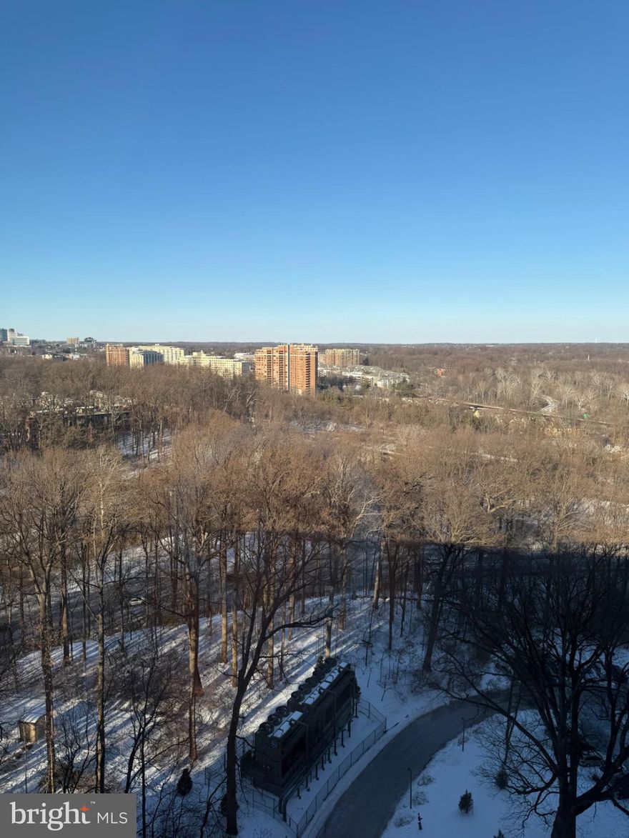 The  luxurious Promenade Towers is located in the heart of Bethesda offering spacious apartments, with gate security, 24 hour manned front desk, a fitness center, outdoor pool, indoor pool, sauna, hot tub and locker room with showers, a grocery store/deli, dry cleaners, travel agent, beauty salon, resident lounge, party and conference rooms. Six lighted tennis and pickleball courts and tennis club house hosting pingpong and special events.  Car charging stations and car wash facilities on-site. Activities including meditation, exercise class, book club, canasta, bridge, and mahjong and many community social events.   Indoor, assigned garage parking included with each unit. Abundant  unassigned exterior parking.  Bus stops at the Lobby with service directly to the Red Line at NIH/Walter Reed.  Located just a minute from 495 and 270. Walking distance to Walter Reed and NIH.  The Promenade is a smoke free building  This unit is a spacious 1330 square foot apartment located on the penthouse level with magnificent panoramic views of the surrounding area.