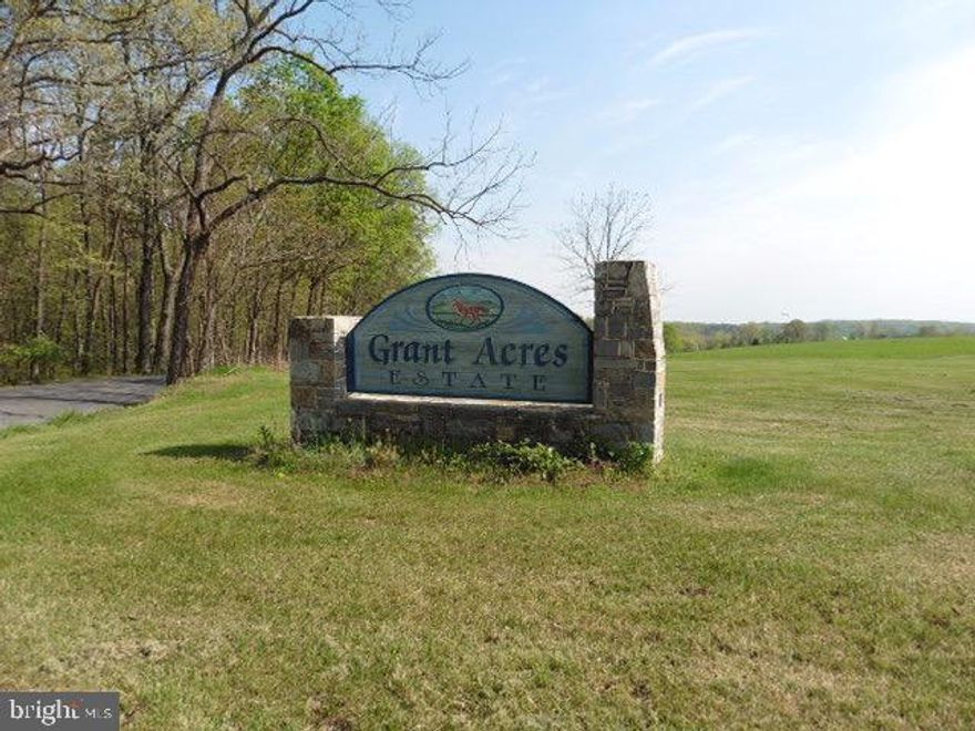 Most fabulous location for your new home. 2 acre lot (choice of 2) with great views, elbow room and excellent location near all amenities including stores, restaurants, VA hospital and easy access to commuter routes 9 and I81.  Community picnic area on the banks of the Opequon. Small neighborhood with big advantages.  This corner lot with huge, mature tree, partial conservation area in back. Also see Opequon Lane Lot 2 listing. Your choice of choice lots.