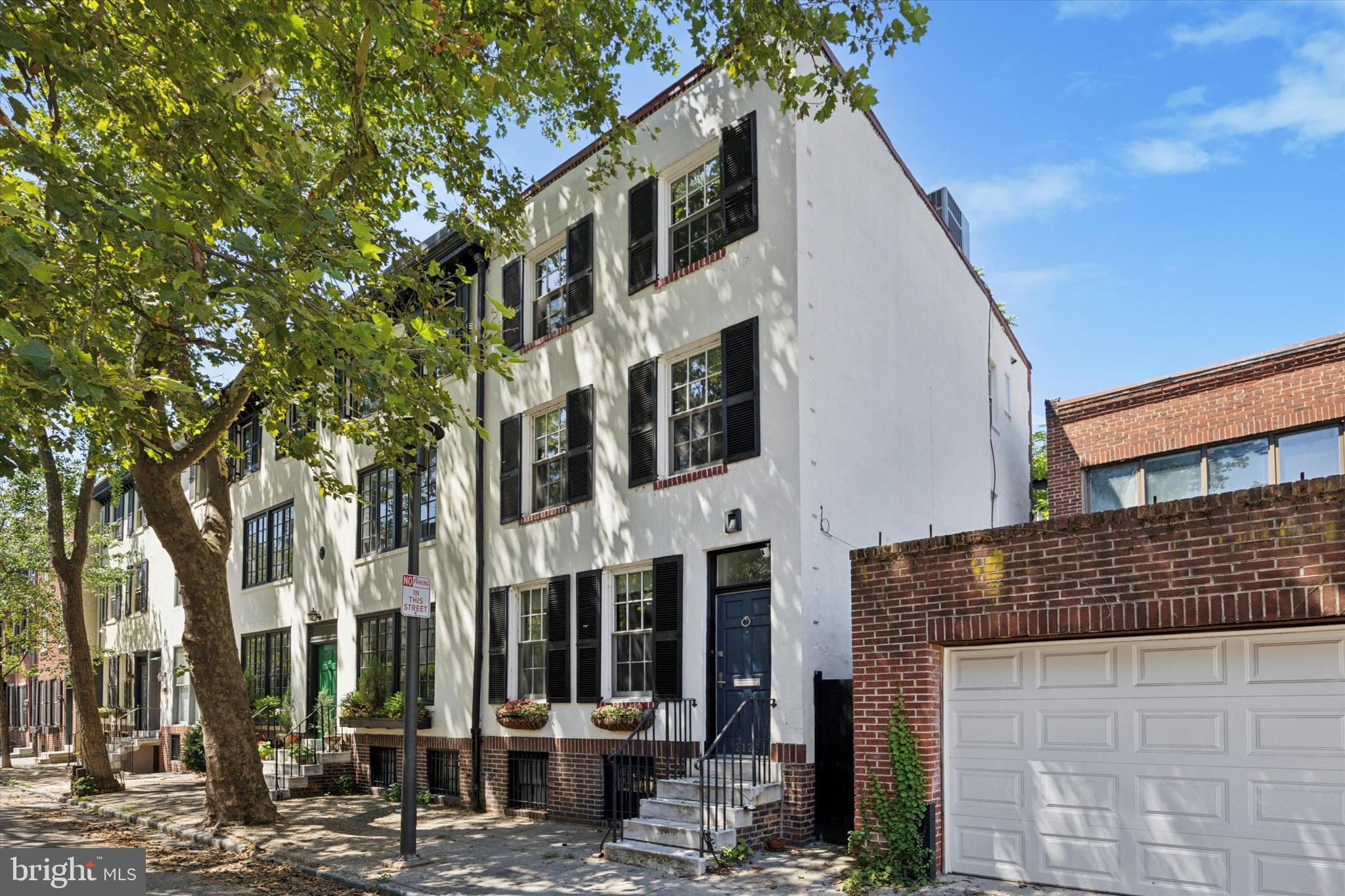 Step into the enchanting charm of this historic 4-bedroom, 2.5-bath home nestled on a quiet, tree-lined street in Rittenhouse Square. Built in 1900, this elegant residence blends original architectural details with thoughtful modern updates, offering timeless sophistication and comfort. As you enter, beautiful wood floors lead you through spacious, light-filled living areas. The updated kitchen is a chef’s dream, featuring sleek countertops, stainless steel appliances, and ample storage—all bathed in natural light from oversized windows. Fireplaces throughout the home add warmth and character to each room. Upstairs, each bedroom offers generous space and serene ambiance. The primary suite serves as a true retreat, perfect for unwinding at the end of the day. The partially finished basement includes a half bath, laundry area, and flexible space ideal for a media room, gym, or home office. Enjoy private outdoor space on the first floor, perfect for al fresco dining or relaxing in the fresh air. Located in the coveted Greenfield School catchment, this home is just a short stroll to Rittenhouse Park, top-rated dining, boutique shopping on Walnut and Chestnut Streets, and all the culture and convenience Center City has to offer.