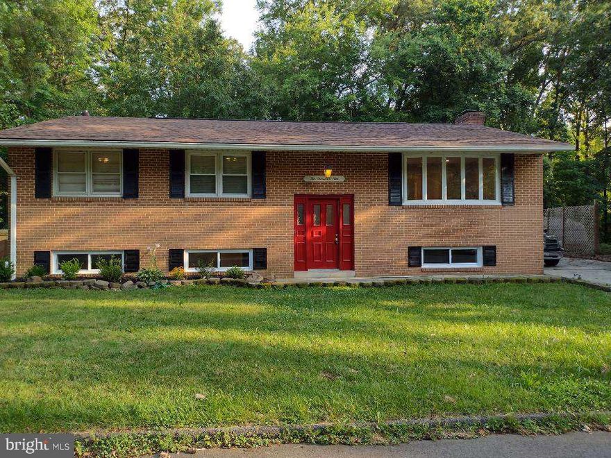 Nice Home! Great location...New full kitchen, exotic granite, stainless steel appliances, 4 bedrooms, 3 full baths, laundry on bedroom level and in lower level. Walk out lower level, new roof, new windows, all new floors, office lower level, wood burn fireplace. Sitting room off kitchen, skylights in sitting room and master bedroom, deck off sitting room, large walk in closet master bedroom, all bathrooms updated. 2 car oversized garage with remotes.