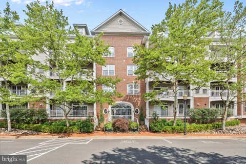 Photo of 5112 Donovan Drive #107, ALEXANDRIA, VA 22304 (MLS # VAAX2062586)