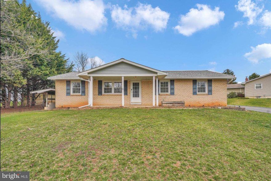 All one level living on .46 acres with open lower level ready for your own finishing touches. New LVP flooring and windows throughout most of the main level. Spacious yard has been well maintained and includes a storage shed, fire pit and privacy fence. Carport can be used for additional parking but also serves as a great entertaining space during the warmer months.  Updates of the home include new roof with architectural shingles in 2021, hot water heater in 2020, upgraded electrical panel and HVAC serviced in 2023.  Well pump replaced in 2020 and seller is having septic pumped this week.