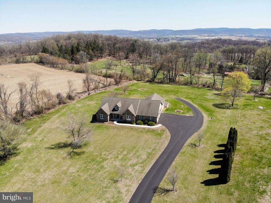 Are you ready to experience a tranquil, country getaway on 2 acres of paradise-like land?  This charming, spacious home is move-in ready with convenient one-level living, exactly what you've been looking for. Located on a cul-de-sac at 10 Paradise Court in the highly sought-after Oley School District, this property offers the perfect blend of peaceful surroundings and modern amenities.

Step out onto a large deck offering panoramic views that stretch for miles, perfect for both relaxing and entertaining. The dream 2-car garage with epoxy flooring features its own bathroom, making it perfect for any car enthusiast or DIY mechanic.

Inside, the chef's kitchen boasts stunning hardwood floors and ample space, perfect for culinary creations. The Great Room is a true highlight, complete with a cozy fireplace and vaulted ceilings, offering a warm and inviting atmosphere.

Retreat to the spacious primary suite, which features a massive walk-in closet for all your storage needs. Enjoy year-round comfort with central air conditioning.

The unfinished walk-out basement offers endless possibilities for expansion or customization, while an additional unfinished room in the attic provides even more space for your creative ideas.

If you're looking for a peaceful country retreat with easy access to Reading, Wyomissing and Allentown, this home is your perfect match!

Professional photos to follow.