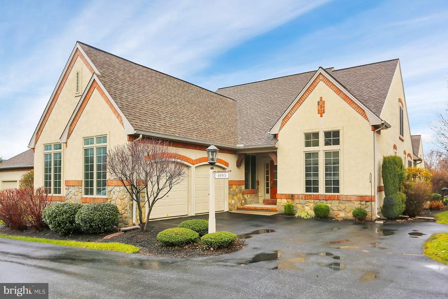Exceptionally maintained Versant condo ready for you!  With over 3,600 sq.ft of finished living space this home will amaze you with its lists of amenities and upgrades...Get the full list from agent:  First floor master suite with two walk-in closets with closet systems, cathedral ceiling in dining room, large white kitchen with solid surface countertops, Brazilian hardwood floors, breakfast nook with built-in floor to ceiling custom cabinetry, cozy sunroom with Brazilian hardwood, large bright living room with gas fireplace, first floor den/office, first floor laundry room, 2 car garage, spacious loft area off two upstairs bedrooms, finished basement with family room and 4th bedroom and full bath, storage galore, Stronghold floor coating in garage, new water heater (2017), water softener, whole house air filter system, humidifier on furnace, stamped concrete patio and much much more.