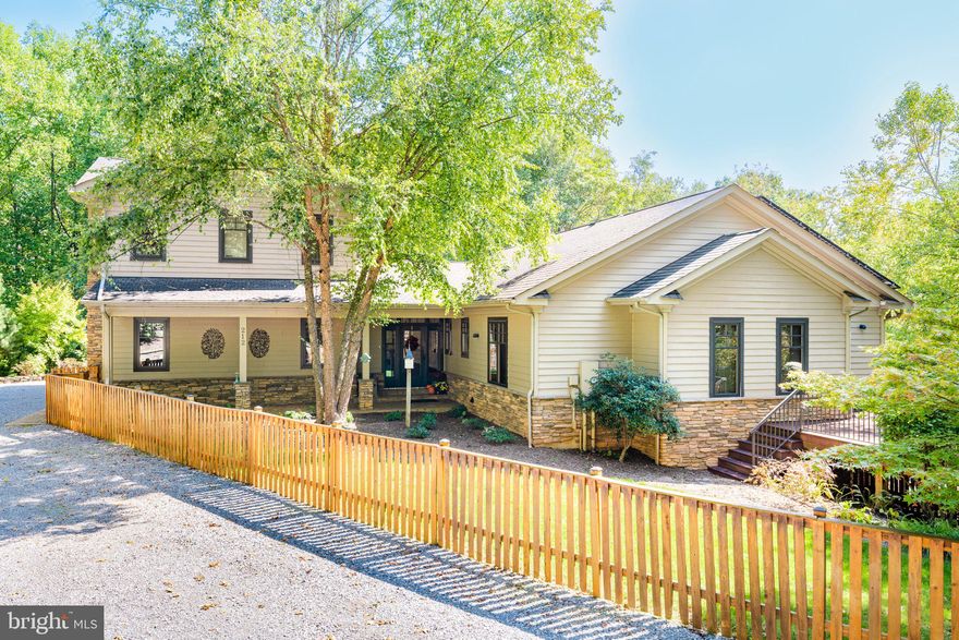 **Stunning 16.28-Acre Private Retreat in Martinsburg, WV**

Discover your dream home nestled on 16.28 acres of tranquil, private land just minutes from I-81 and Martinsburg’s conveniences. This 5,400 sq. ft. luxury estate offers an exquisite blend of modern amenities and rustic elegance, featuring 5 spacious bedrooms and a 2-bedroom apartment for guests or rental income.

The home is designed for sustainability and comfort, boasting solar power, geothermal heating and cooling, generator backup, and heated floors in select rooms. The elegant interior showcases rich cherry hardwood floors, custom cherry cabinetry, and built-ins throughout, ensuring both beauty and functionality.

Step outside onto multiple expansive decks with a fully equipped outdoor kitchen, featuring a gas range, gas grill, and the premium XL Kamado Joe ceramic grill  for wood-fired cooking. Relax in your new hot tub, swim in the lap pool, or enjoy evenings on the outdoor patio complete with a wood-burning fireplace.

The estate includes a 4-car garage with an electric vehicle charging station and ample space for all your toys. For the gardening enthusiast, the property features a greenhouse, vegetable gardens, fruit trees, and a stocked pond. The grounds also offer space for chickens, adding to the property's charm and self-sufficiency.

Inside, cozy up by the gas fireplace or the soapstone  wood stove on the lower level. With bidets in some bathrooms and heated floors, a luxurious master suite, and high-end finishes throughout, this home is a masterpiece of comfort, privacy, and sustainable living.

All of this seclusion and luxury, yet you’re just a short drive from shopping, dining, hospitals, and other conveniences. Don’t miss the opportunity to own this unique property!