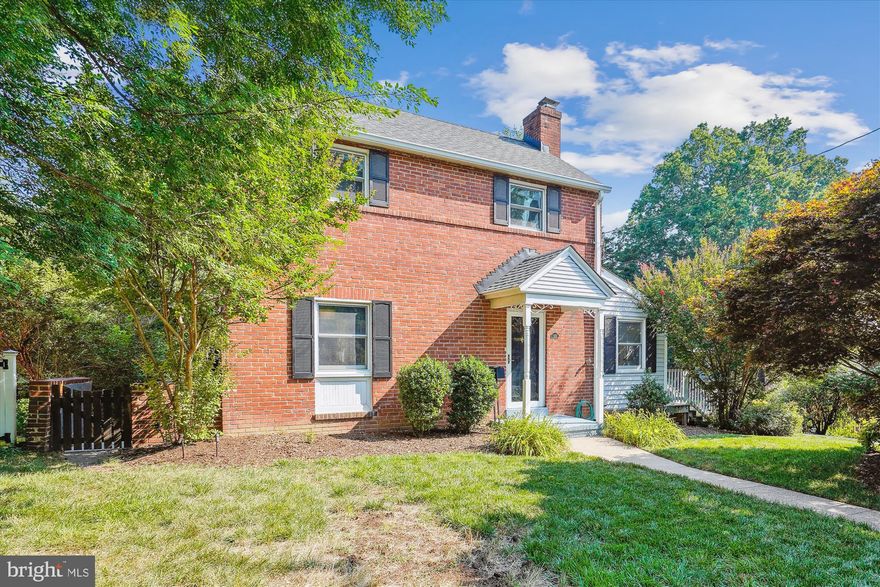 Fantastic renovated three story colonial located in quiet Overlee Knolls with a fantastic location - just 0.7m to the East Falls Church Metro and 0.6m to highly sought after Westover.

The red brick colonial has an inviting portico, black shutters, and side entrance into a mudroom. Upon entering the front door, you're greeted with light soaring through the storm door into a charming family room with renovated gas fireplace and new tile surround, hardwood floors and a coat closet. To the right you'll find the side addition with mudroom and storage or use it as a sun room with access to the deck. Continuing on the main level, to the left of the front door, is an updated dining room with custom wood wainscotting, hardwood floors, a powder room, pantry, and then you walk into a spacious and sunny renovated kitchen with white shaker cabinets, Quartz Counters, vent hood above the professional grade Bluestar 36” gas range with 6 burners, Bosch Refrigerator with ice/water dispenser, tile backsplash, Bosch dishwasher, and eat-in kitchen space with tons of windows. Do not miss the secret storage drawer! Off the kitchen there’s a door to the large deck (23 feet by 18.5 feet) with stairs to the amazing yard and storage underneath. 

The real showstopper of this North Arlington home is the yard. The basement walks out to a patio, which is only part of the large backyard. Owners of this home get to enjoy an extra 18.5’ of side yard thanks to the side lot (see survey). The current owners redid the retaining wall in 2021 and included stone hardscaping, landscape lighting, French drains, and new landscaping to really upgrade and showcase the backyard, which is one of their favorite features of the home and what they’ll miss most (besides the wonderful neighbors). 

The upper level of this home features a large primary suite with vaulted ceilings, custom blinds, a ceiling fan, a mini split for extra temperature comfort, a walk-in closet, and an en-suite bathroom with skylight, dual sinks, and a walk-in shower. The hallway has a bathroom with a tub that is shared by the two secondary bedrooms, each with hardwood floors. 

The lower level features built-in bookshelves at the base of the stairs. There are engineered hardwoods throughout, with a built-in wet-bar with beverage center. The large rec room has recessed lighting, door to the yard, and a mini split for extra temperature control. Additionally, there’s a 3rd full bathroom with a storage closet and the laundry area. The utility room features additional storage. 

The home has a driveway perfect for two cars to park next to each other, in addition to parking on the street (no permit required).  Long list of updates available.