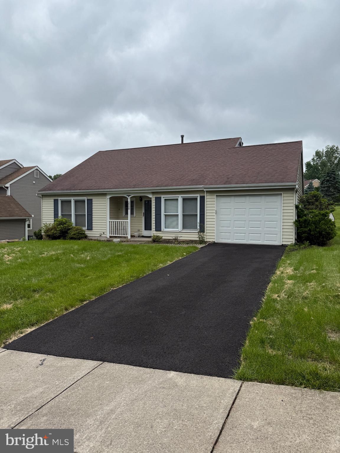 This spacious home features major mechanical upgrades already completed for your peace of mind—including an updated roof, newer central air, heating system, and hot water heater.