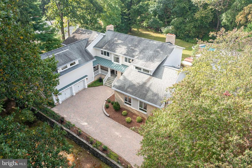 $124,000 Price Improvement in Oakton! Situated on 1.53  private acres with mature trees on a lovely gentle  rise, 3238 Fox Mill RD features 4 bedrooms and 4.5 updated baths--including a much-desired guest BR and BA suite on the expansive main level. This is the rare house that presents better in person than in photos.  The kitchen is designed for entertaining family and friends, with ample cabinet and counter space and 3 sinks. Five sets of French doors across the back of the house bring in good afternoon light; and 3 fireplaces add warmth and charm. On the second level are 3 additional bedrooms, including a spacious Primary suite with two very generous closets, two balconies, and a Primary bathroom with jetted tub, separate shower and custom vanities. A second en suite upstairs bedroom could also be considered a 2nd Master bedroom with dressing room and an over-sized closet with built-ins.  The 3rd bedroom also has a generous walk-in closet and a balcony overlooking the back yard and pool area. Finally, over the attached 2-car garage is a great finished space that offers many possibilities: a 2nd-level family media room, or a play space for children, or a home office or home business center. With over 5,100 square feet just on two levels, this house has spacious rooms and great closet and storage space. There is also a basement level with 2 additional finished rooms with closets (approximately 300 square feet below grade).  The detached second 2-car garage  could also be used as a poolhouse, separate office, or fun space for entertaining--lots of room for sofas, big screen TV, pool table or bar; and the paved driveway and long drive offers parking for 6 more cars at least. This is a warm, friendly-feeling home with a casually elegant vibe and a mix of traditional and modern fetaures-- truly one of a kind.  Recent improvements include new washer/dryer and refrigerator in the laundry room; newly refinished hardwood floors; new paint and carpet; and newly updated bathroom vanities, toilets, and light fixtures. The landscaped lot reflects the relaxed feeling of this property and includes 2 small ponds and tiered decks leading to the Hot Tub and Gunite pool. Excellent school tier of Waples Mill Elementary/Franklin Middle School/ Oakton High School.  Just minutes from major commuting routes and Fair Lakes, Fair Oaks, and Oakton Shopping Centers, 3238 Fox Mill nevertheless feels like a private oasis. No HOA--Home Warranty included.