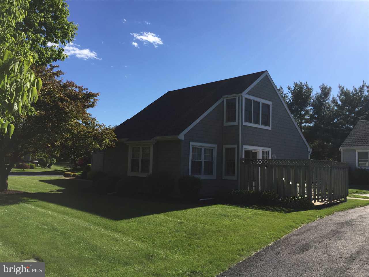 Enjoy the full service of condo living with the privacy of a detached, single home. This Cape Cod home offers a ceramic tile entrance, wood floors in the kitchen & dining rooms, 1st floor master bedroom with walk in closet, 1st floor laundry room, 2nd floor bedroom, full bath and a loft overlooking the living room. This home has a 2 car garage. The association fee covers the lawn, snow, trash & exterior maintenance.