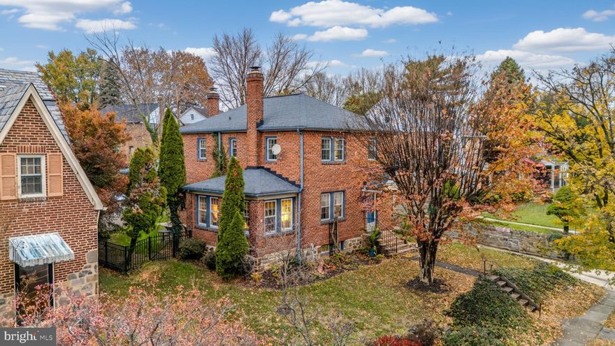 Welcome home to 5124 Edmondson Avenue! A beautiful detached brick home that seamlessly blends modern updates with timeless character nestled in the Ten Hills neighborhood of Baltimore. 
The main level offers a spacious and light-filled living room with a brick fireplace adding to the charm, and hardwood floors that flow into the dining room. A versatile four-season room provides the perfect space for a home office, studio, or creative space. The kitchen features abundant cabinet space and granite countertops, complemented by a convenient half bathroom.
Upstairs, you will find three generously sized bedrooms with generous closet space and a well-appointed bathroom. The finished lower level expands the living space with a second fireplace, an open family/entertainment area, additional storage, and another full bathroom.
The large rear yard is fenced and thoughtfully landscaped, it is a great place to relax or entertain. It also provided access to your oversized  two car garage that can fit two vehicles and still has room for plenty of storage. This home captures the best of city living with a neighborhood feel. This property is located in close proximity to downtown Baltimore, shopping centers, and minutes from major commuter routes, I-695, I-70, Route 40.