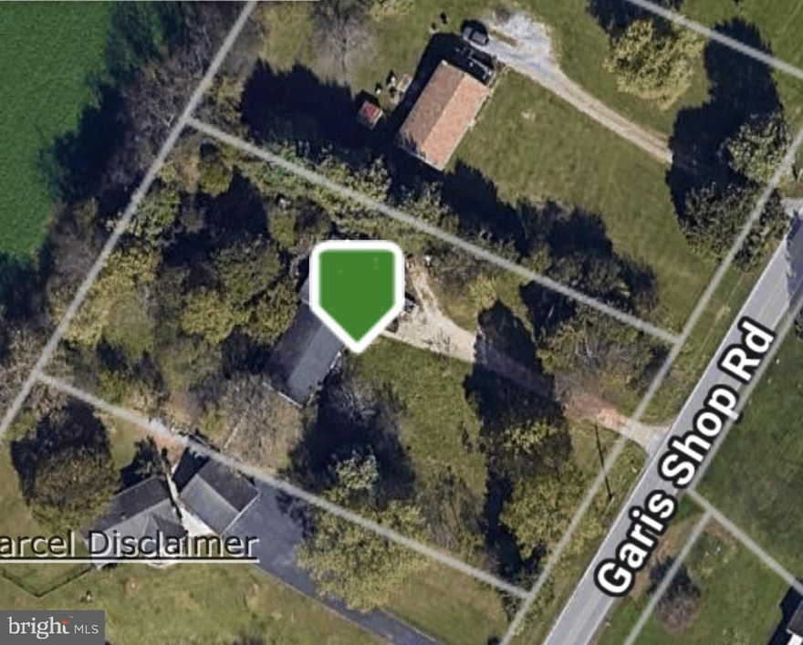 BEING SOLD TO SETTLE AN ESTATE! AS-IS, WHERE-IS. House burnt down several months ago. All debris and trash removal and clearing to be the responsibility of the buyer.  Surrounded by nice homes in a nice rural location. For those willing to get it ready for building, could be an opportunity! CASH ONLY