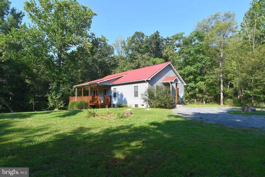 Welcome to Foggy Bottom Lane!  One level home with 3 bedrooms and 2 full baths.  Large kitchen area with stainless appliances.  Front covered porch with deck space also.  Enjoy the large yard and just over 3 acres of property.  The best part is the water front access to Sleepy Creek.  A prime location to get away from it all and relax.  Lots of natural light and charm on this well maintained, beautiful property.