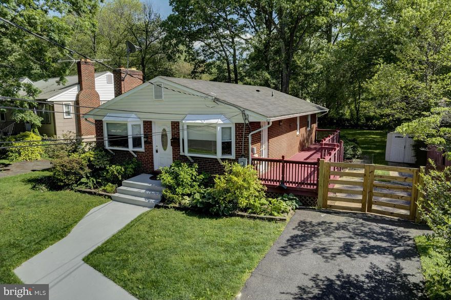 Renovated, MOVE-IN-READY brick rambler in quiet & convenient Fairfax Woods * 1049 sqft x 2 = approx. 2100 sqft total * big fenced rear yard with patio * deck off DR * newer kitch with honey maple cabinets, brkfst bar, new ceramic tile, new fridge, newer DW & range * beautiful hardwood floors * fireplace * GAS HEAT * new carpet, fresh paint * newer roof, HVAC, windows * Come take a look in person!