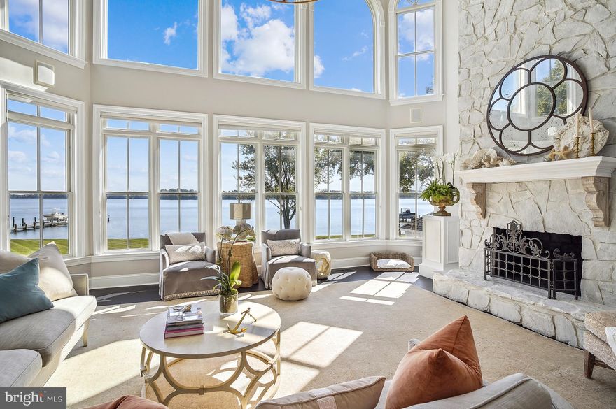 Welcome to an unparalleled waterfront retreat where luxury living meets the serene beauty of the Wye River. This property, situated on over 2 acres of land directly across from Wye Island, offers a lifestyle of opulence and relaxation. With over 8,000 square feet of living space across three levels, this meticulously renovated residence is a masterpiece of contemporary design and timeless elegance. Multiple living areas, a gourmet kitchen with top-of-the-line appliances, a formal dining room, spacious library, and a luxurious primary suite create an environment of grandeur and comfort.

No detail has been spared in the recent high-end renovations, which have seamlessly blended modern sophistication with the property's timeless charm. From top to bottom, every inch of this home exudes quality and style. Including but not limited to upgraded appliances, freshly painted rooms, hand painted custom wallpaper from the UK, custom chandeliers and drapery, and recently upgraded hardwood floors with Ebony stain.

Breathtaking views of the Wye River greet you from nearly every room in the house. The screened in porch is the perfect place to enjoy a peaceful morning taking in the passing boats on the Wye River. Enjoy the tranquility of the water, watch the sunsets over the horizon, and embrace the waterfront lifestyle to the fullest. The vast outdoor spaces include beautifully landscaped gardens, a private dock, and a waterfront patio with gazebo, making it the ideal location for both relaxation and entertainment.

Step into a world of luxury and leisure with your own Olympic-sized swimming pool, surrounded by a spacious sun deck, lounge area, and gazebo. Bask in the sun, entertain in style, or take a refreshing dip while gazing at the panoramic water views.

Set on a private corner of Wye Road, this property offers the utmost in privacy and security, with a state of the art security system. This estate is conveniently located in Queenstown, just minutes to popular shopping at the Outlets, local stores and restaurants on Kent Island, and a short drive to Annapolis or Easton, both known for their charming shops, restaurants, and cultural attractions. By water, the home provides easy access to Saint Michaels and the Kent Narrows, popular summer destinations. The perfect blend of easy access to amenities while offering privacy.

200 Wye Road is a testament to luxury living in a picturesque waterfront setting. The combination of high-end renovations, a stunning Olympic-sized pool, and the panoramic views of the Wye River make this residence a true gem on Maryland's Eastern Shore.

Prepare to be captivated by the grandeur of this property; schedule a tour today and experience the epitome of waterfront luxury living.