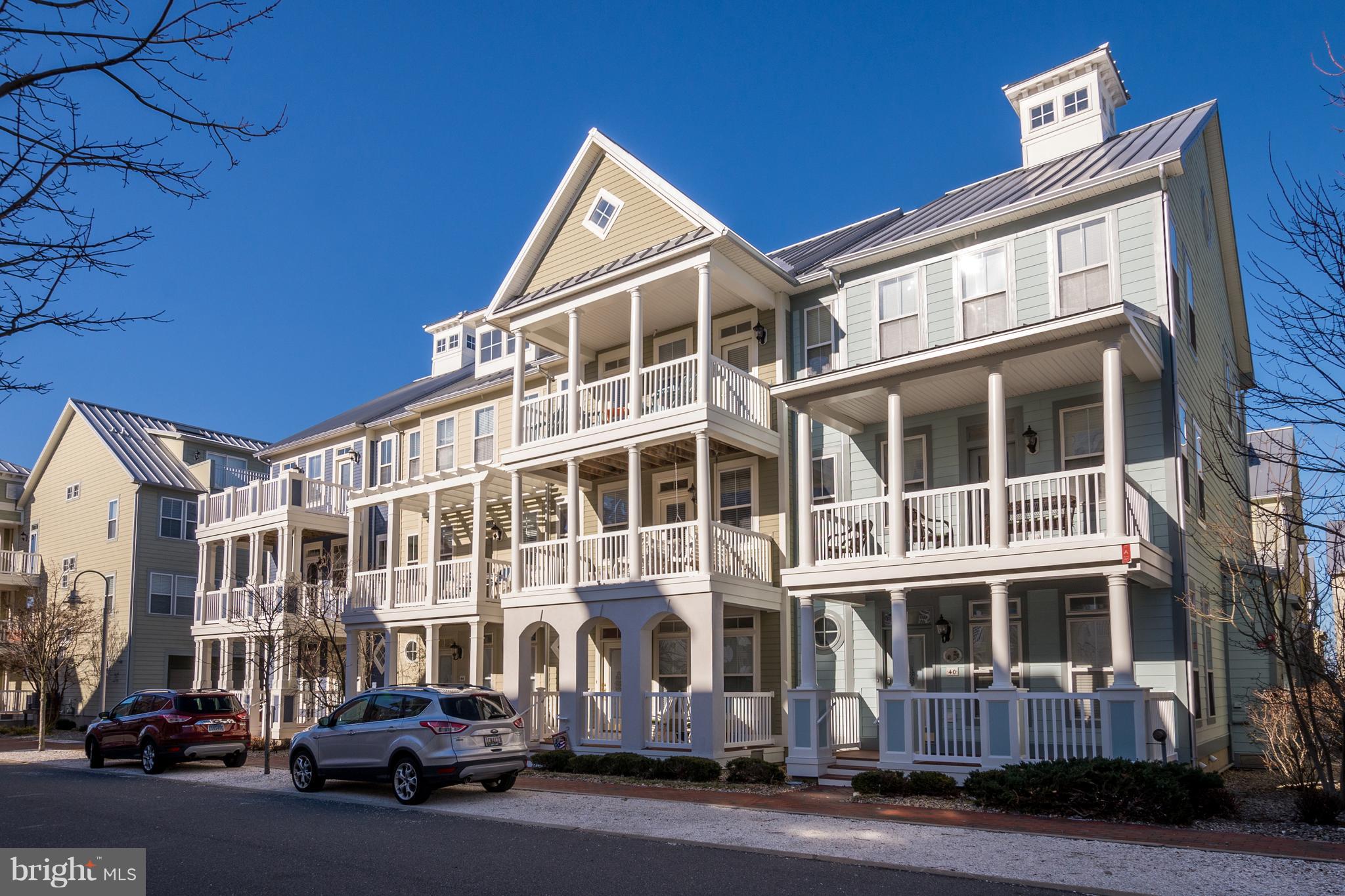 Spacious 4 story beach home with coastal flare throughout. Professionally decorated and offers 4 bedrooms + den, 4 full & 1 half bath. Property is being sold fully furnished and ready for the summer season! Relax on one of the three covered front porches or the private rear balcony on the fourth floor. Enjoy the Bay views from the front balconies. Entertaining will be a breeze on the main level with a large modern kitchen, featuring a double-oven, granite counter tops & center island w/ seating. There is also a separate dining /breakfast area leading into the spacious living room. Take a look today and start experiencing all the world class amenities that Sunset Island has to offer including indoor/outdoor pools, private beach, fitness center, clubhouse, walking trails, interactive fountains, 24hr. security, and much more!