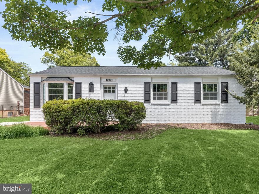 Beautifully renovated rancher located on a quiet cul-de-sac on a spacious level lot in Columbia, not subject to the Columbia Association annual charge! This spacious 4-bedroom, 2.5-bath home boasts a primary suite addition and updates throughout, including the kitchen, bathrooms, new roof, engineered hardwood flooring, carpet, lighting, and a modern color palette.  You’ll love preparing your favorite meals in the spacious kitchen that features granite countertops, soft-close white cabinetry, and stainless appliances, with a dining area perfect for family meals. The huge family room showcases a high cathedral ceiling with exposed wood beams, a fireplace, and a custom wet bar with a wine refrigerator.   Charming accent molding and archways adorn the home and there's a cozy nook leading to the living room, adding character to the home. Retire to the primary bedroom suite addition highlighting a cathedral ceiling, walk-in closet, and a sizable full bathroom with an oversized shower featuring accent tile detail. Three additional bedrooms, one with its own powder room, and an updated hall bathroom complete the main level.  The lower level provides a bonus room, a large storage and utility room with walk-up stairs to the yard, and a recreation room with new carpet and recessed lighting.  Enjoy outdoor living on the multi-tiered deck surrounded by a privacy fence and a level backyard with a storage shed. Columbia offers abundant shopping, dining, and entertainment options and easy access commuter routes.  This home perfectly blends modern living with classic charm.