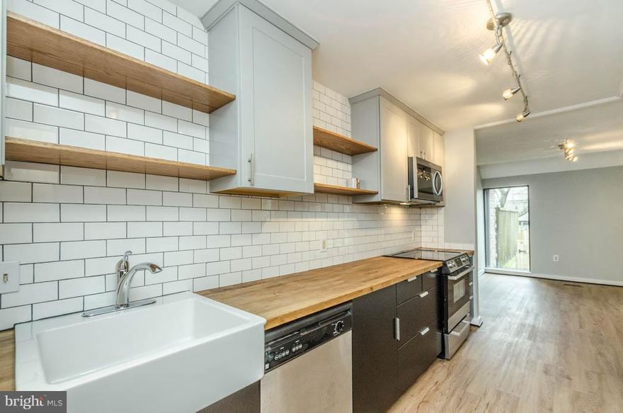 Welcome Home! Great city location-Move in ready, this contemporary and RENOVATED unit offers 3 bedrooms, 2.5 baths, study room, walk in closet in master's, stainless steel appliances,  fence courtyard; perfect for your gardening and entertaining, 1 assigned parking and plenty of parking on the streets. Enjoy the tennis courts, and much more this community has to offer. Close to 83 and Sinai Hospital.