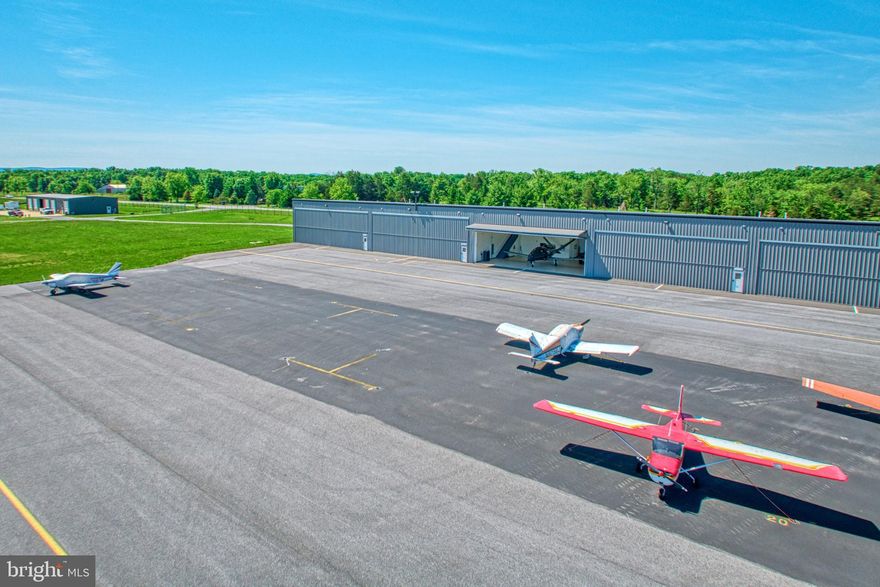 Elevate your aircraft ownership experience with a choice of premium hangars at Winchester Regional Airport (KOKV), conveniently situated less than 90 minutes from Washington, D.C. This extensive development comprises 32 hangars, with three units already sold and three more available for immediate delivery. The available hangars include sizes of 52’ x 50’ and a single larger unit of 60’ x 50’. Future phases will feature diverse hangar sizes, including standard 60' x 60' units, a unique 150' x 150' hangar, and a dedicated restaurant pad, enhancing the facility's amenities. Each hangar offers the potential for extensive customization, including options for fully equipped offices, comfortable pilots’ lounges, or additional storage solutions, allowing owners to tailor spaces to their specific needs. Located in Frederick County, aircraft owners benefit from lower personal property taxes, providing a substantial financial advantage. Being outside the SFRA DC flight zone also facilitates private and unrestricted travel. Investing in Winchester Regional Airport not only secures a valuable asset but also ensures a luxurious and efficient aviation lifestyle. Seize this opportunity to be part of one of Virginia’s top emerging aviation hubs, where privacy and cost-efficiency converge with unparalleled convenience. This section of Airport Road is easily accessible from route 50, Millwood Pike, and close to downtown Winchester, and just 35 minutes from historic Middleburg.