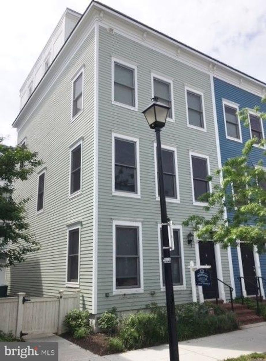 Immaculate and almost-new bright and sunny 4 level corner townhouse built in 2012 offers 3 bedrooms, 3.5 baths, large family room, study, luxury kitchen with breakfast bar, rear deck, roof top terrace and 2 car garage. Features include hardwood floors throughout, stainless steel appliances, gas fireplace in living room, extensive storage and blinds on all windows. Plumbed-in gas grill conveys with rental. Located just 4 blocks to Braddock St. metro, 6 blocks to the shops and restaurants of King St,  2 blocks to Trader Joe's and Harris Teeter, and a quick walk to the river and waterfront parks.