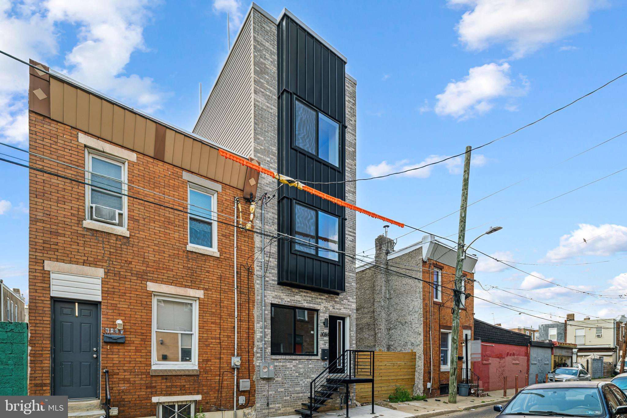 Located in HOT HOT Port Richmond , this home is walking distance to the local favorite spots, Open the door to find a contemporary open floor plan complemented by hand-scraped bamboo floors and impeccable crown molding and custom mill work. The gourmet chef is greeted by a State-of-the-Art kitchen featuring an island, high end Samsung Stainless Appliances, soft close Shaker style cabinetry and solid stone counters. Luxurious Bathrooms are appointed with imported Porcelain & Marble tile, seamless glass shower enclosures and rainfall shower heads. The finished basement presents a versatile space for a media room or home gym, the possibilities are endless. Ascend to the upper levels, Bedrooms have to offer immense amount of natural light and ample closet space. The master suite on the third floor is a private sanctuary, featuring a massive walk-in closet with custom built-ins, and a luxurious bedroom area and a lavish en-suite bathroom with modern soaking tub, luxurious stand in shower and elegant double vanity. Step onto the rooftop to discover a sprawling roof deck with breathtaking views of the city, completing this magical abode. SmartHome Technology such as Nest Thermostats, Schlage Combo Deadbolts and RING Video Doorbells allow you to adjust temperature, let guests in and see who s there from the convenience of your roof-deck, or anywhere in the world! Bluetooth connected Surround Sound Speaker System and USB Outlets come standard. Full backyard for grilling or relaxing. 10-Year Tax Abatement. Walking distance to public transportation, local favorite spots, shopping centers and close to center city Philadelphia . Home is exquisitly built by Alpha Construction Group in the hot area of Port Richmond and new construction is popping up everywhere! Get in on the ground floor while you still can.
Agent is related to seller!