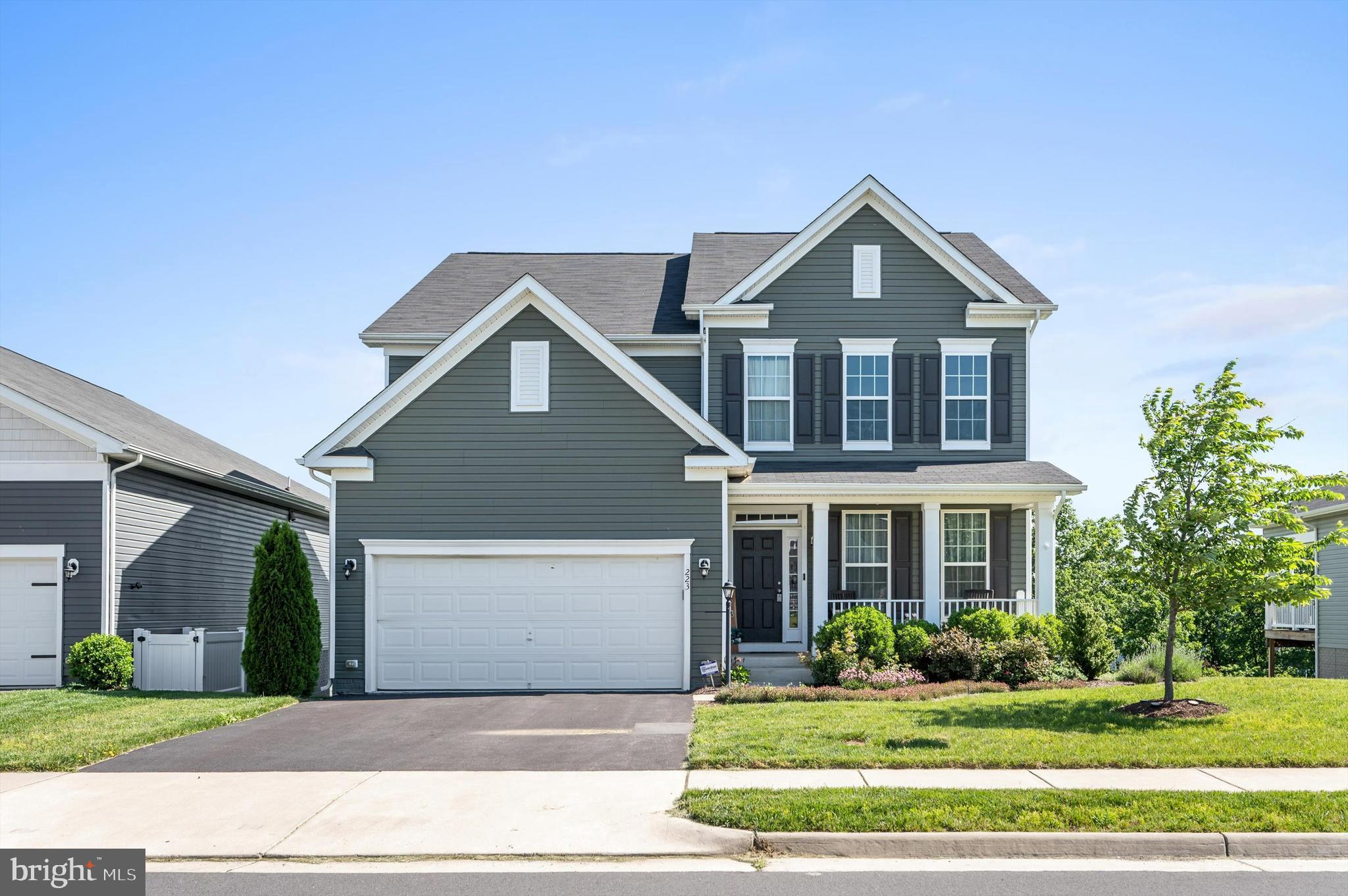 Welcome to 223 Patriot St in sought after Snowden Bridge. Built in 2019, this modern colonial-style home offers 4,100 square feet of living space on 3 finished levels. The location is surprisingly private, backing to common area with mature trees and walking trails. The main level features a dedicated office, ideal for remote work or a home library, a formal living/dining room, and an enormous family room. The kitchen features a large island with breakfast bar, double ovens, a walk-in pantry, gas range, and ample cabinet space. Step outside from the kitchen onto the oversized trex-deck and fenced backyard, perfect for entertaining. Upstairs, you'll find 4 generously sized bedrooms, including a large owner's suite, and the laundry room. The walk-out level basement features a huge rec room along with the 5th bedroom, 3rd full bathroom, and unfinished storage areas. Located in the Snowden Bridge, this home offers access to a recreation center with indoor basketball and tennis courts, a community pool, playgrounds, walking trails, and more. The children’s academy provides year round child care, after-school programs and summer camps. Welcome home!