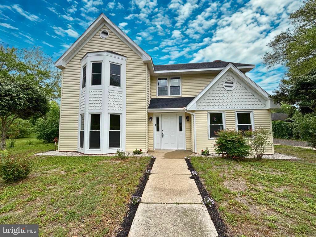 Welcome to this charming newly remodeled Victorian-style home nestled in the heart of historic Quantico, Maryland less than 10 minutes from Salisbury, Maryland! Although located within this iconic area, the rules of the district do not apply to this home, as it was built in 1986. This stunning two-story home sits on over a half-acre lot, complete with four sheds/outbuildings for additional storage.
Recently renovated in 2024, the home boasts modern updates while preserving classic charm. As you step inside, the foyer greets you with a grand staircase. To the right, a cozy den/bonus room offers versatility for your specific needs, while to the left, a spacious living room features a large bay window that fills the space with natural light.
The fully remodeled kitchen is equipped with all-new stainless steel appliances, soft-close cabinets, and granite counter tops. From the kitchen you will find the dining room that flows into the living room.
At the rear of the house you will find a 1/2 bath, and a cozy family room with wood-burning fireplace. From the family room, step outside to an expansive 600+ sq ft screened-in porch, ideal for outdoor dining and entertaining. You will also find an additional versatile room off of the family room, perfect as an office, craft room, or potential bedroom, completing the main floor.
Upstairs, you'll find four spacious bedrooms, including an owner’s suite with its own private bathroom and an additional full guest bathroom both offering tiled bathtub/shower.
The home has been updated with all-new systems, including heat pumps, a new hot water heater, a new roof with architectural shingles, and a new well pump. Freshly installed LVP floors, new windows, new fixtures throughout and a recently added vapor barrier.
This home offers a unique opportunity to own a piece of historic Quantico, while enjoying all the comforts of contemporary living. Don’t miss the chance to make this spectacular house your new home!