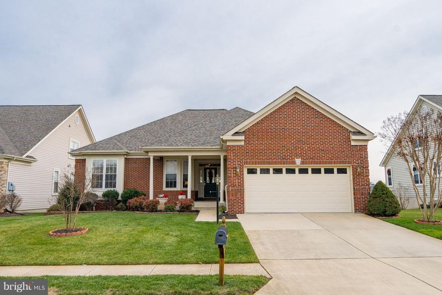 Stunning sought-after Tigerlily with picturesque water view that will delight your senses. Two furnished levels, 3 generous-size bedrooms, 3.5 baths, custom 4-5/8 crown molding on main level, 2 car garage, Sun Room, Trek deck with vinyl-clad railings, custom motorized remote control awning, workshops with air filtration and exhaust system. You won't want to miss it!