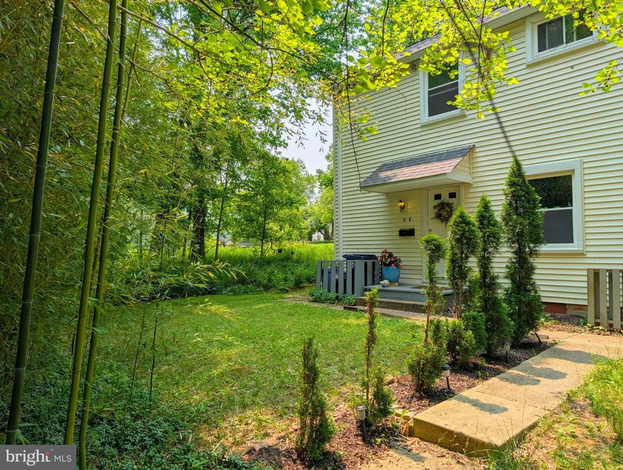 Great value in this two bedroom townhome on a large CORNER LOT in original Greenbelt. Adjacent to protected woodlands; it’s like having your own private forest preserve! Refinished Oak hardwood flooring on both levels. RENOVATED KITCHEN opened  into dining area, with new quartz countertop & cabinets, herringbone tile backsplash, under-cabinet lighting, new appliances (stove, dishwasher, microwave), garbage disposal & ice maker with plumbed water line * The home also features: UPGRADED recessed lighting & new drywall ceilings plus added custom built-in bookcase with library sconces * Built-in nook for key/shoe drop * new painted baseboards * BATHROOM REMODEL included new tile flooring, new tiled tub surround, new plumbing & lighting fixtures, new vanity & antique medicine cabinet * New interior door hardware throughout * Full house heating and cooling with mini-split system, plus baseboard heating throughout * Outdoor outlet added for patio lights. The city sidewalk network leads to Roosevelt Center - groceries, theater, aquatic & community centers, restaurants, salons, bakery, banking & more. Enjoy Greenbelt Lake, Buddy Attick Park, tennis courts, ballfields, playgrounds and lots of other recreational opportunities. * Monthly Greenbelt co-op fee includes all property TAXES, insurance, trash pickup, and co-op membership fee which provides public space maintenance, renovation program, replacement reserves & most structural maintenance (walls, roof, wiring, plumbing, hot water heater & more.) Total of fees and services is $747.