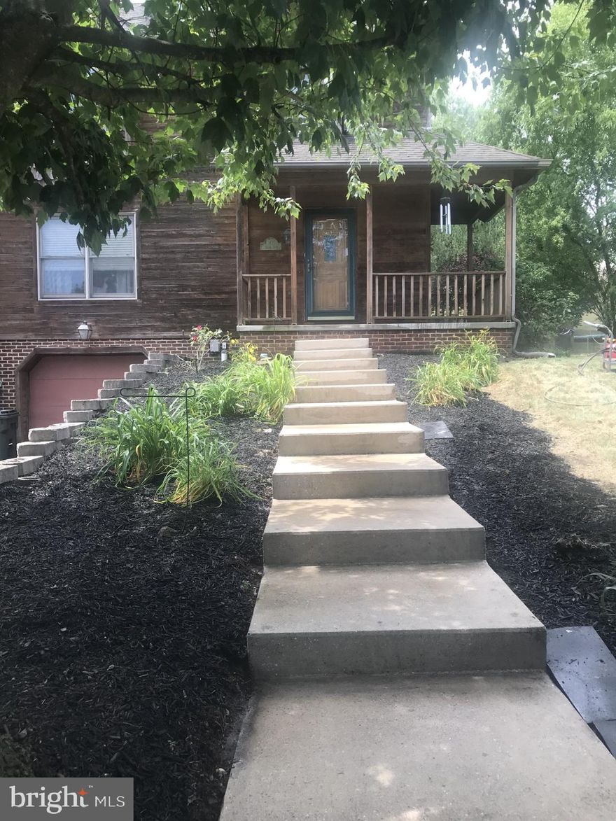 This charming end unit townhouse greets you with an adorable wrap around porch where you can sit and chat with your neighbors. Upon stepping inside, the spacious living room features a gas fireplace and is open to your dining room and kitchen and provides the perfect space for entertaining. Sliding doors from the dining room lead to a  deck and a fenced in backyard where you can enjoy a cocktail or morning coffee, watch the sun rise or set and is ideal for outdoor gatherings. Upstairs you will find vaulted ceilings, and generously sized bedrooms with plenty of storage space. The garage can accommodate two cars tandem-style or be utilized as a home gym or storage space. Accessible from both the basement and the exterior, this charmer offers versatility and convenience. Located close to Route-30, downtown York, and with easy access to I-83, this home offers proximity to shopping, dining, and amenities while maintaining a peaceful residential setting. Don't miss out on the opportunity to make this your new home! Schedule a showing today and explore all that this property has to offer. No HOA! Professional photos will be posted on Thursday.