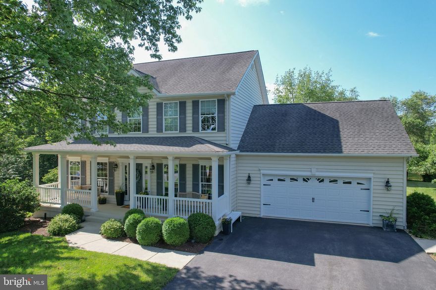 Tucked away on a quiet cul-de-sac in Brookfield on the Potomac, this timeless two-story 2400+ SF Colonial home—built in 2007—sits on over half an acre of lush, landscaped privacy, with exclusive access to the Potomac River and a suite of neighborhood amenities.
With 2,400+ finished square feet on the main levels and an additional 980+ square feet in the ready-to-finish walkout basement, this 4 BEdroom/ 3 Bath home offers the perfect blend of style, space, and serenity.
Step into a grand foyer featuring a sweeping wooden staircase and an open-concept layout. To your right a versatile front room currently used as an office would also shine as a formal dining room. To your left, an elegant sitting room flows gracefully into the living room, anchored by a gas fireplace and filled with natural light. Graced throughout with natural hardwood floors, the main level is a classic stunner from bottom to top.
At the heart of the home, the expansive kitchen includes a large island with high bar seating into the featured morning room wrapped in wall-to-wall windows. This sun-drenched space is a birdwatcher’s paradise, offering panoramic views of a backyard filled with mature foliage, perennial plantings, and daily visits from butterflies, deer, and feathered friends.
Upstairs, the highlight is the serene primary suite featuring tray ceilings and a spa-inspired ensuite bath. Enjoy a double vanity, tiled floors, a private water closet, and a separate soaking garden tub room paired with a walk-in glass shower and built-in ledge—designed for true relaxation. Three additional spacious bedrooms and a full bath round out the upper level.
The composite deck, backyard trails leading into the tree line, and sidewalk-lined community make outdoor living both peaceful and practical.
As part of your exclusive Brookfield community homeowner’s benefits, you’ll enjoy a private boat ramp, a 14-acre riverfront park, basketball courts, a playground, pavilion, and the picturesque backdrop of the Blue Ridge Mountains and Potomac River.
Whether you're seeking small-town charm, riverside recreation, or a nature-filled retreat, this beautifully kept home offers the best of West Virginia living—with easy access to hospitals, commuter routes, and nearby local towns, tour 34 Monongahela Ct., Falling Waters, WV today!