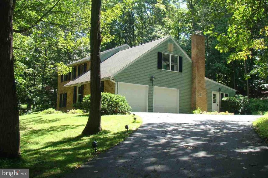 Well maintained home situated on a choice lot in White Rock Acres. This wonderful home features wood flrs in LR, DR, Kit, Brkfst Rm, Hallway, Mstr Bdrm & 2nd Bdrm. Mstr Bth & Hall bath have been beautifully remodeled. 1st flr addition boasts 4 Season Rm & sundrenched Breakfast Nook w/views of the wooded lot & frequent wildlife visitors. The well designed Mother Hubbard Kit offers ample cabinets, built-ins & counter space.