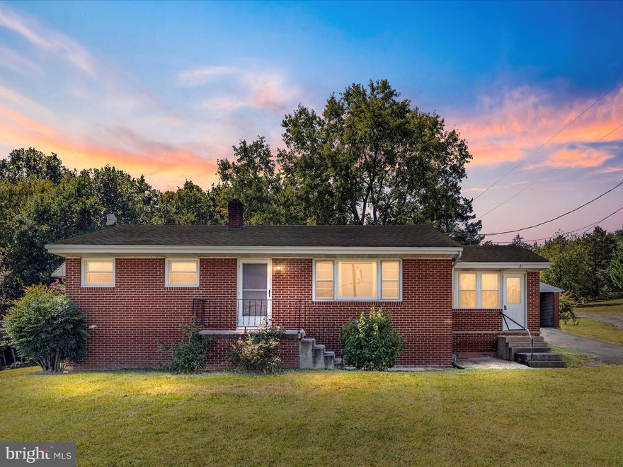 Why rent when you can own this well-kept brick rancher on nearly half an acre, just outside the town of Strasburg! This 2-bedroom, 1-bath home features an unfinished basement, a spacious yard, a detached 1-car garage, and a storage building.

Recent updates include a new sump pump and grinder pump, a 6,000-gallon cistern that was cleaned and sealed in May 2025, and a septic system pumped the same month. The HVAC system was replaced in 2022 and includes a backup oil heat source for those extra-cold days.

The property is made up of two parcels—one with the home and one with the garage. Convenient location, and affordable size, this home is a great opportunity to stop renting and start owning!

The seller is selling the property "AS  IS".  The home does need some TLC.