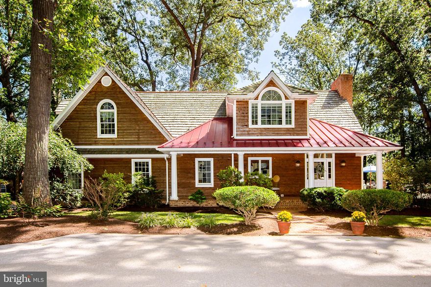 Welcome to this charming Cape Cod–style retreat, gracefully set along a private, secluded drive where timeless character meets modern comfort and exceptional versatility on over 10 acres of serene countryside, complete with a meandering stream.  From the moment you arrive, the home’s classic style is accented by rich metal roof and cedar siding, sets a warm and enduring tone. A generous parking area and an attached two-and-a-half-car garage provide both convenience and functionality for everyday living and entertaining.
At the heart of the home, the inviting kitchen showcases warm maple cabinetry that beautifully embraces a spacious island with seating for two+. Striking granite countertops and stainless steel appliances complete the space, offering both style and performance. Designed with flow and connection in mind, the kitchen opens seamlessly to the dining area, making gatherings effortless and inviting. The dining space is truly a showpiece, featuring soaring cathedral ceilings and dramatic wall-to-ceiling windows that flood the interior with natural light while framing peaceful views of the surrounding landscape.
Step outside to an expansive deck overlooking rolling  fields,  complete with a playground and wide-open space for recreation, gatherings and/or quiet relaxation under the stars,  a truly private setting.  
The main level includes a flexible first-floor room that can serve as a home office or additional bedroom, offering versatility to suit a variety of needs. Centralize great room with built-in bookshelves and brazillian cherry floors continues the home's cohievsive design.  The primary suite serves as a private retreat, featuring a luxurious owner’s bath with a freestanding soaking tub, walk-in shower, and dual vanities, all designed for comfort, ease, and everyday indulgence.  Two additional well-proportioned bedrooms are situated off a central foyer area, offering a smart and comfortable layout with added privacy. These rooms share a well-appointed full bath, making the upper level both functional and welcoming for family or guests. 

A standout feature of the property is the impressive 38x48 post and beam metal skin pole building with loft and office with entry door—an exceptional space for the mechanic, hobbyist  or serious storage needs. Outfitted with 10x12ft overhead  doors and designed to accommodate equipment, vehicles, and recreational toys,  includes a car lift, making it perfectly suited for automotive work, farming operations.
Adding to the property’s charm and utility is a Timber Frame cedar siding, metal roof, hay barn with stalls on lower level,  the upper level is inviting and flexible space, ideal for gatherings/parties of all kind,  hobby farming, or creative pursuits. 
Blending rustic charm, refined finishes, and unmatched utility, this secluded Cape Cod retreat offers a rare combination of privacy, functionality, and natural beauty—an exceptional place to call home.
Conveniently located just minutes to town, 20m to Hunt Valley or 795.