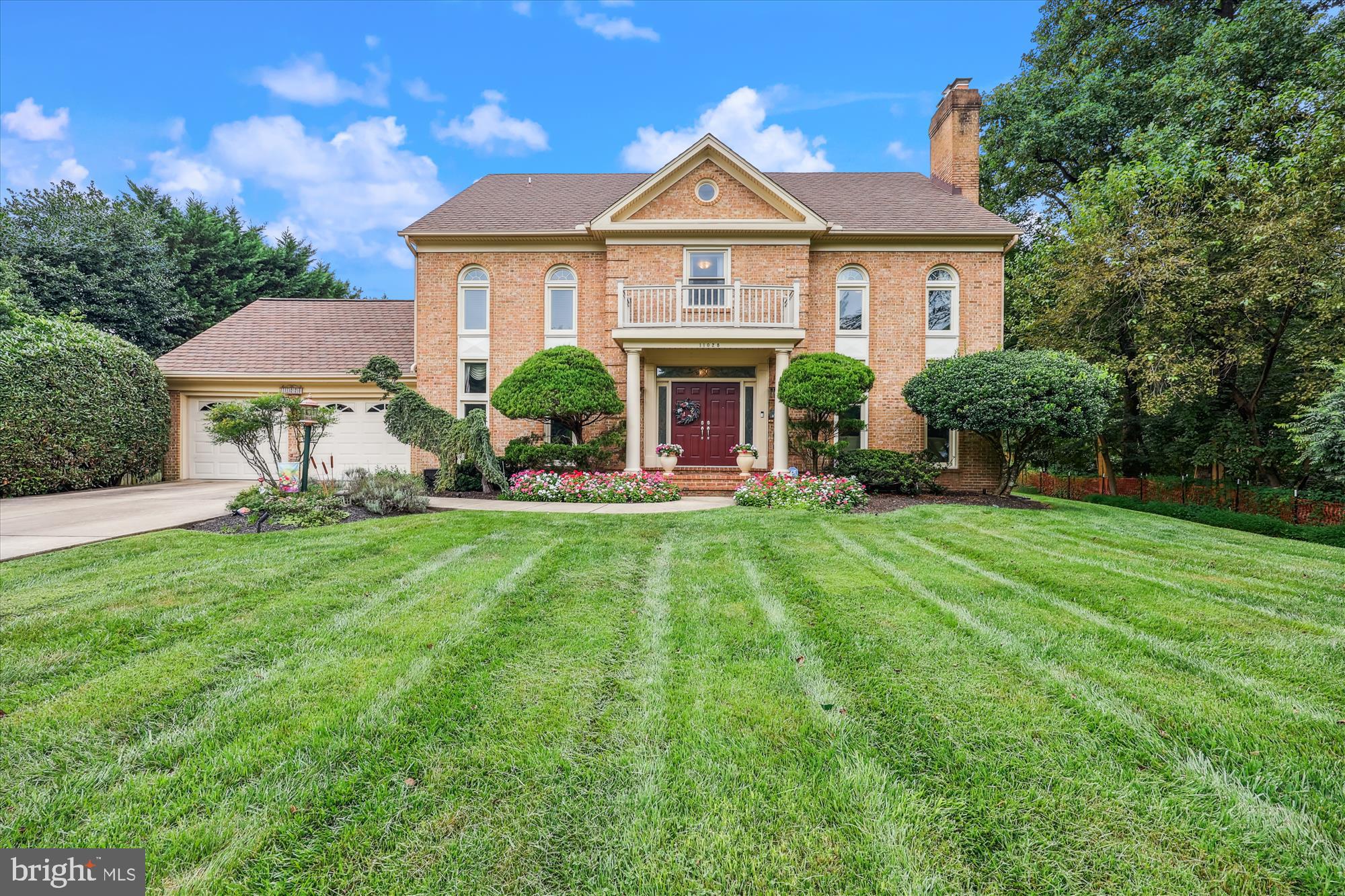 Welcome to this exquisite 4-bedroom, 4.5-bath home located in the highly sought-after Timberlawn subdivision. Meticulously maintained by the original owners, this residence stands out with thoughtful upgrades and luxurious features throughout. Sitting on one of the largest lots in the neighborhood, the private backyard oasis invites year-round enjoyment, showcasing a recently added screened-in porch with a soaring cathedral ceiling and a dedicated barbecue terrace. Step out to the upgraded three-tier Trex deck, which includes a screened gazebo, a tranquil fountain, and a deluxe sunken hot tub—ideal for entertaining or relaxing in style. Make sure to notice the adjacent peaceful stream bed for added fun. The newly installed landscape lighting has added another level of year-round enjoyment.
Inside, this home seamlessly blends timeless charm with modern sophistication. Few residences can boast 4 fireplaces, each adding warmth and character.. Abundant natural light fills the space through newly installed triple-pane, low-E windows. The main level features a refined home office with custom-built-ins, a spacious dining room, and a stunning, fully renovated gourmet kitchen outfitted with stainless steel appliances, a wine cooler, a bar area, and an adjacent table-space breakfast area. A formal living room offers an elegant setting for guests, while the oversized family room boasts wrap-around windows and a striking stone gas fireplace, creating a cozy and inviting atmosphere. The main-level laundry room adds convenience to everyday living. The new steel front double doors have decorative stained-glass accents.
The expansive finished lower level includes a potential fifth bedroom, a full bath, a versatile bonus room—ideal for a home gym, media room, or playroom—and ample storage. Upstairs, the serene primary suite features a spacious walk-in closet and a spa-inspired bath with a soaking tub, walk-in shower, and double vanities.
Perfectly positioned for lifestyle and convenience, this home is just steps from North Bethesda Market and offers walkability to Whole Foods, Starbucks, CVS, China Garden, and Seasons 52. This home is steps to Pembroke Pool, that features three pools, four tennis courts (including pickleball), and a tot lot. Nearby Pike & Rose offers a vibrant mix of dining, shopping, and entertainment. Outdoor enthusiasts will love the Bethesda Trolley Trail, a scenic six-mile path for walking and biking, and the nearby Timberlawn Local Park with its basketball court, soccer fields, picnic areas, and playground.
Commuters will appreciate the unbeatable location—just a short walk to the Grosvenor Metro station and Strathmore Music Center, with easy access to I-270, I-495, Rockville Pike, and only five miles from the D.C. border. Thoughtfully designed for comfort, style, and convenience, this rare gem offers an exceptional lifestyle in one of the area’s most desirable communities.