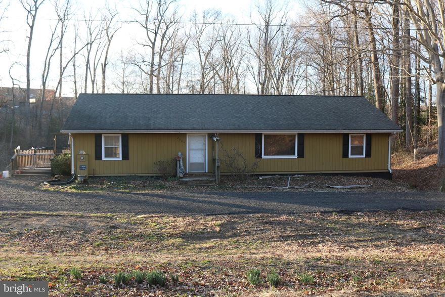 Calling ALL Investors! This raised ranch/rambler is an "investor's delight!"This diamond in the ruff is truly an investment opportunity.  The home is situated on a 1-acre lot in Potomac Shores's backyard.  What can I say except this home offers so many possibilities.  Close to golfing, schools, county parks, state and national parks, Quantico, commuter lots,  commuter bus stops, I95, VRE, shops, and restaurants.