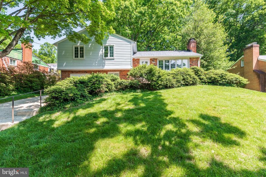 New price, new photos,  More upgrades include new furnace, new light fixtures, new light switches with dimmer controls, furniture removed, floors polished, basement cleaned and painted, old shelving and cabinetry removed.  Shows much better and cleaner.   Very well-maintained 4- level split home, very clean. Beautiful wood floors, 3 large bedrooms 2 baths on upper level,  large living room with wood-burning fireplace, formal dining room, eat-in kitchen.  separate entrance from dining room to rear yard, and sliding glass doors on lower level to private rear patio.  Over-sized one-car garage.  Newer replacement double-pane windows throughout, newer roof, furnace/ac systems, gutters, downspouts. Kitchen cabinets replaced a few years ago, but look great.  Digital thermostat, alarm system, high-efficiency gas furnace.  Lots of upgrades to a very solid house.
     Mature landscaping, bushes, tall trees, many flowers and plants throughout the yard.  Koi pond in rear yard needs to be brought back to splendor.  Walking path of flagstone in rear yard.  Rear of property does back to Beltway barrier wall, but a nice size yard of 12,864 sq. ft. offers plenty of privacy, very little traffic .
     Larger homes in the neighborhood are selling for 3X more than this.  Bring some ideas and a vision for updates and future expansion.  Opportunity to own in a neighborhood at a good price, and gain equity.  This is the kind of quiet neighborhood where many residents walk their pets, walk and jog through the neighborhood streets, and enjoy the neighborhood amenities such as parks, swimming pool, local shopping.