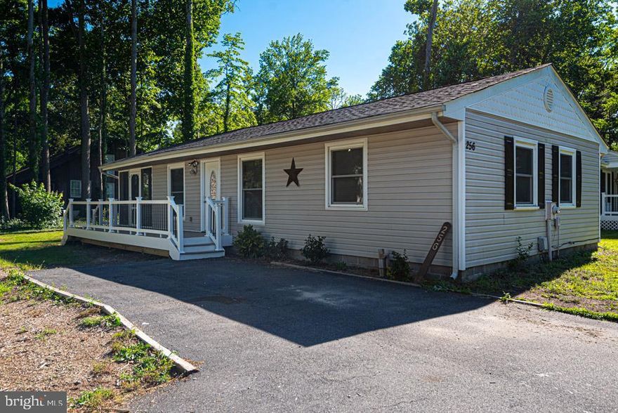 Completely redone home ..from the new roof & HVAC  to the front porch. Granite countertops, stainless steel appliances and hickory hardwood throughout .  Steps  to the community center and White Horse Park ..What a great beach house or primary home.  Enjoy the Ocean Pines community with all the great amenities it has to offer . Including swimming pools, restaurants, tennis courts, marina with yacht club, golf, walking & biking trails. Minutes from the Ocean City beach...make sure to schedule your showing today!