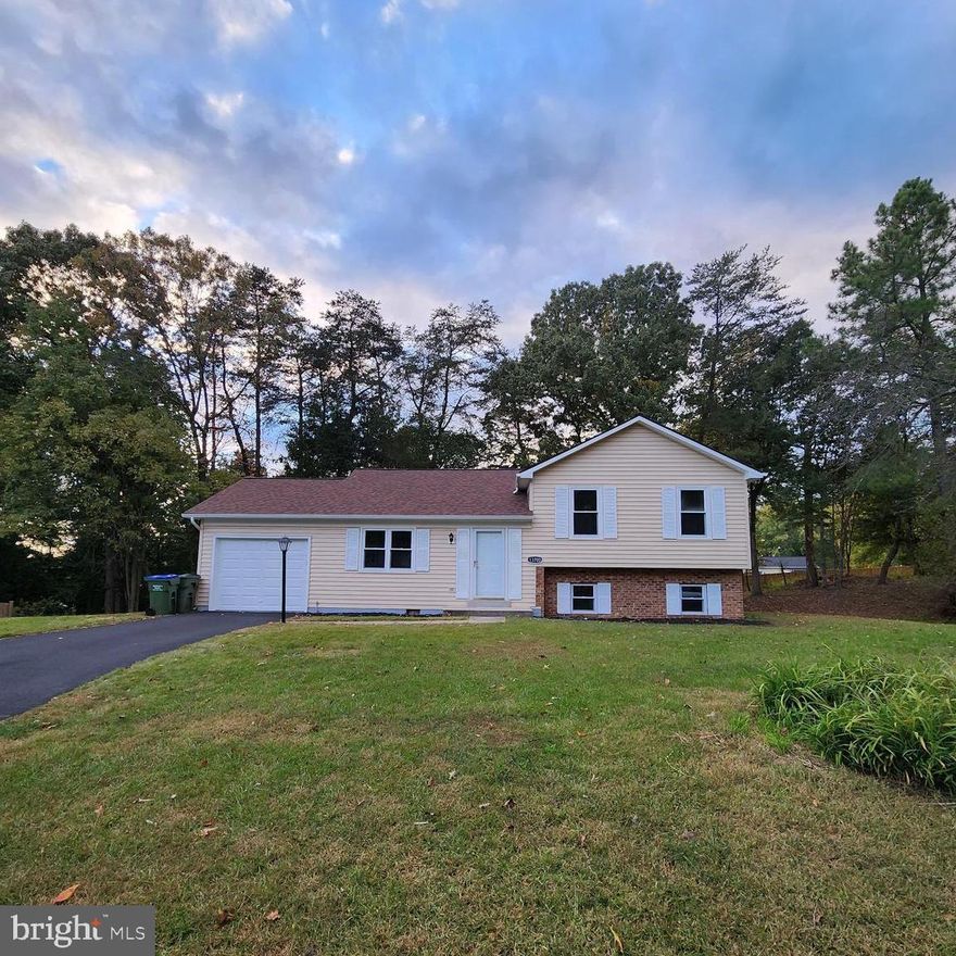 Welcome to 13700 Bluefin Drive, a stunning gem nestled in the Woodbridge/Dale City community. This home boasts an enviable location on a spacious .26-acre lot, tucked away in a quiet cul de sac. From the moment you step through the front door, you'll be struck by the pristine condition of this property; it's truly turnkey and ready to welcome its new owners with open arms. The list of renovations is nothing short of impressive. The interior showcases new LVP and hardwood flooring, while every window, siding, and the roof has been replaced to enhance both aesthetics and functionality. The HVAC system been replaced and the plumbing has been upgraded to copper pipes, ensuring peace of mind for years to come. The heart of this home is undoubtedly its gourmet kitchen, complete with an extra-large granite top island that's perfect for culinary creations and gatherings. All appliances have also been replaced . The luxurious touch extends to all bathrooms, each adorned with new vanities, lighting, and elegant frameless shower doors. For car enthusiasts and those who value a clean, organized space, the garage features epoxy flooring, giving it a polished and modern appearance. But the real showstopper is the spacious rec room, offering ample room for relaxation and entertainment. Step outside to discover the double deck and a vast backyard providing a sense of privacy that's a rare find. With so much to offer, this home is a must-see, and it won't be on the market for long. Don't wait; seize this opportunity to make 13700 Bluefin Drive your dream home now.