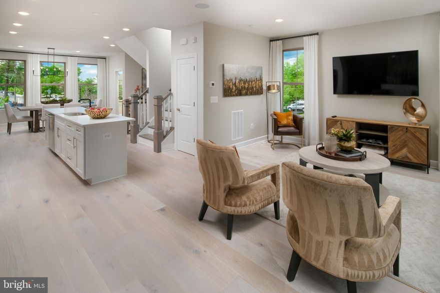 This beautiful front load 2-car garage townhome boasts an open floorplan that is great for entertaining! The lower level recreation room is great space for a family room, home office or additional guest bedroom and bathroom. The main level boasts an expansive chef's kitchen perfect for entertaining. Enjoy cozy nights in your open great room with friends and loved ones, or take the party outside and enjoy starry nights on your expansive main level deck off the great room. The upper level features a primary suite with a large walk-in-closet and two secondary bedrooms with a hall bath. *Photos are of a similar home. Design selections have not yet been made for this home.